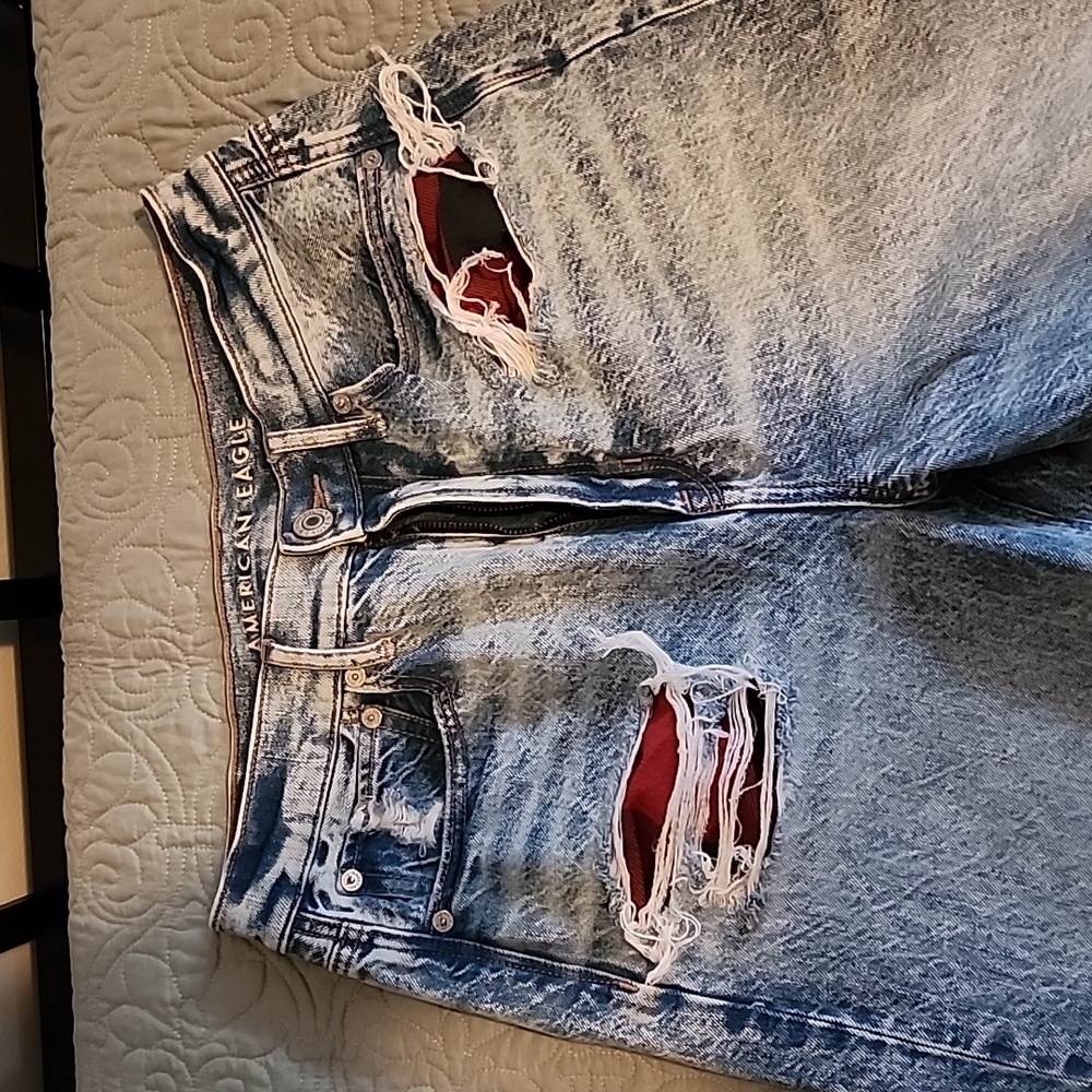 American Eagle Outfitters Distressed Light Blue Jeans with Red Patch Detail
